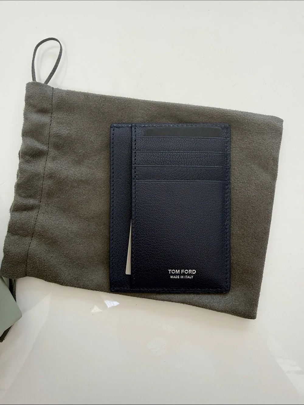Tom Ford navy leather card holder with T-line detail
